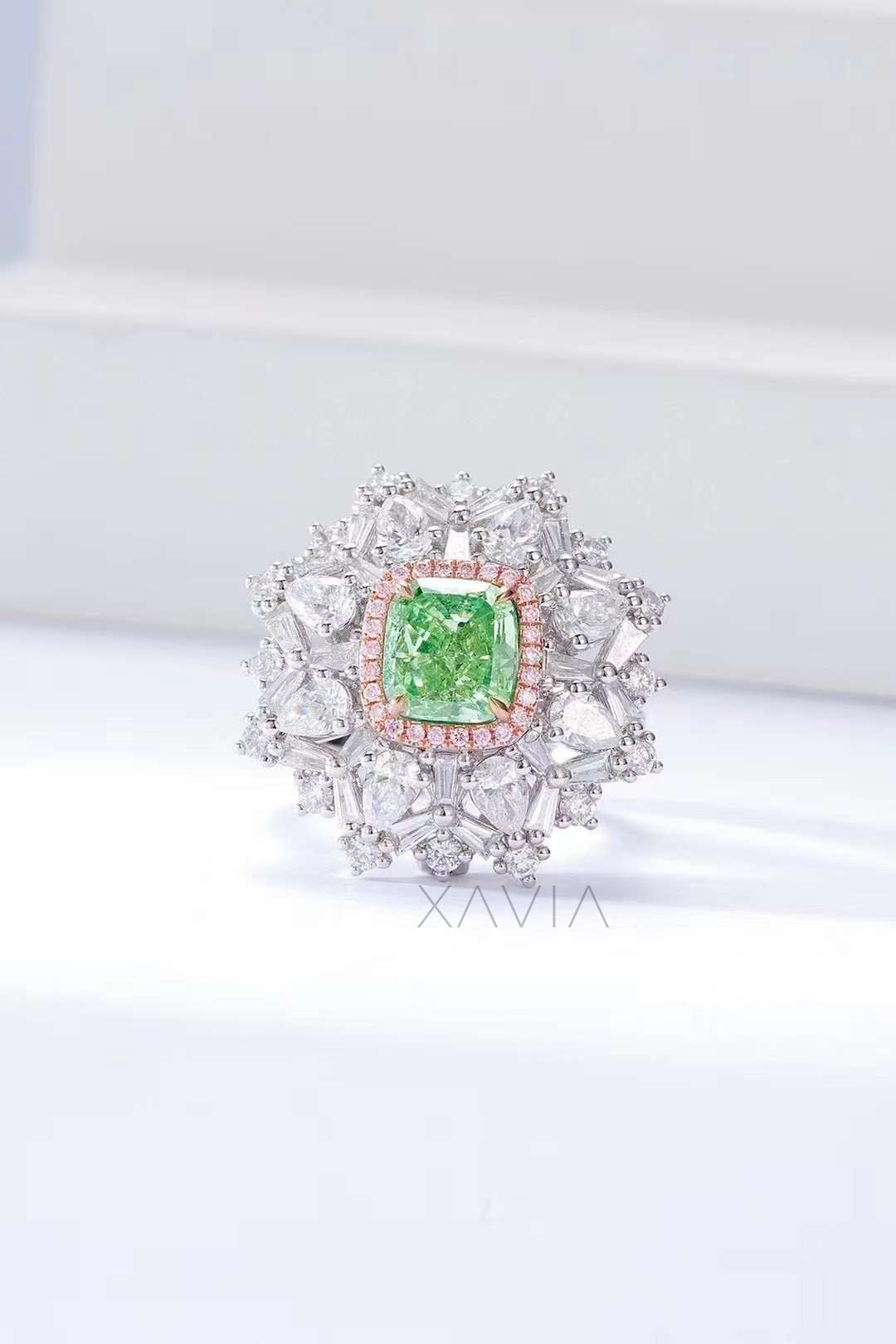 cushion cut green diamond halo cocktail ring with pink pavé halo and white diamond starburst cluster, front view
